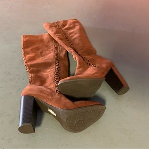 Rust color knee high boots. Very good condition